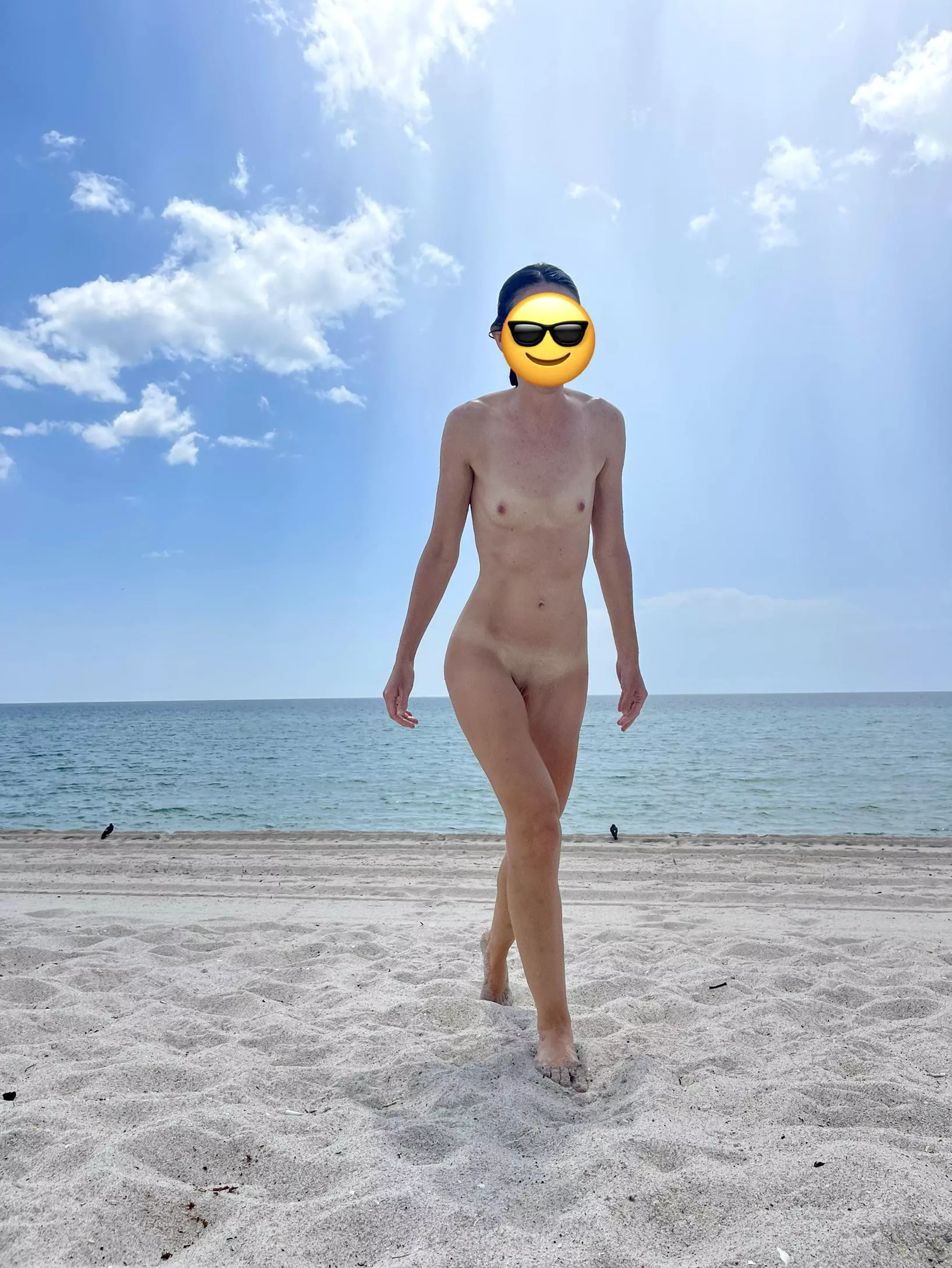 Nude at the beach in front of tons of people! Would you stare? posted by Secret_Adventures