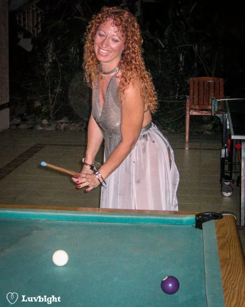 Dee Luvbight playing pool in Clejuso cuffs at the Hedo III rec center. October, 2004. by MickLuvbight