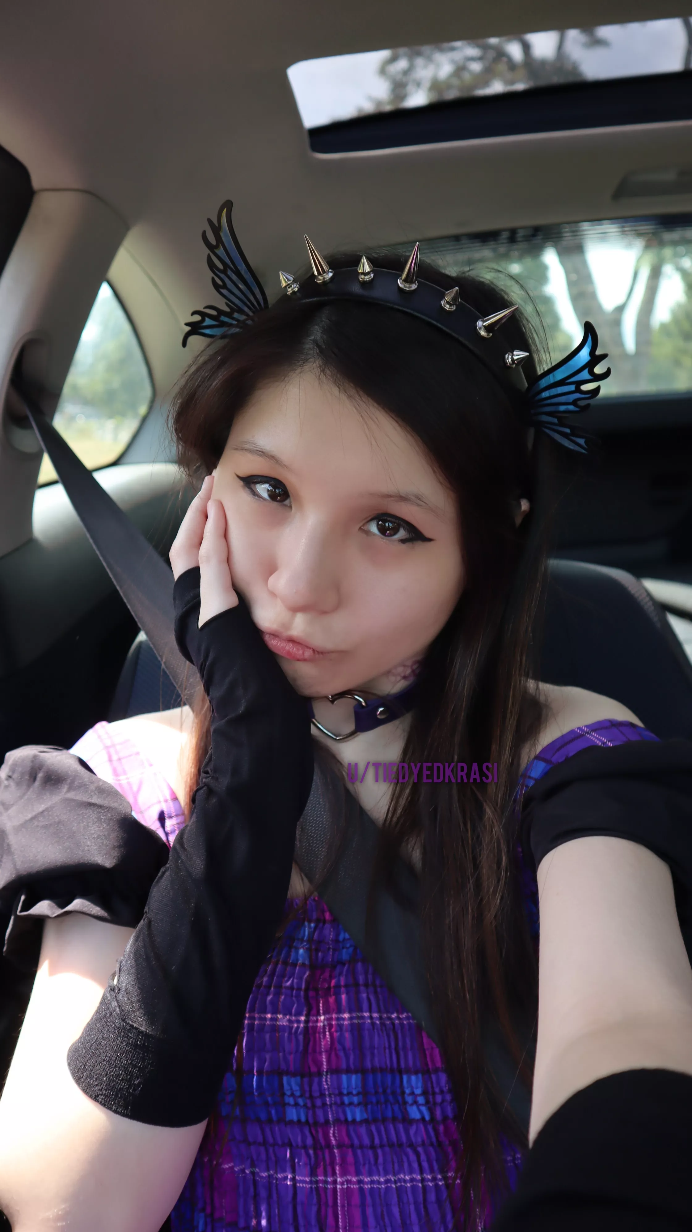 My face in the car at the cemetery posted by tiedyedkrasi