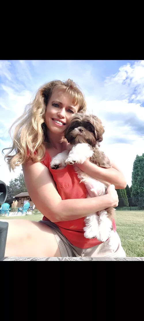 Gotta smile when holding my new puppy by LanaRN69