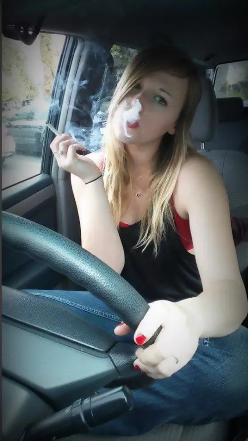 Sneaking one in the car between classes by darkpoetries