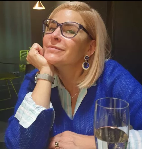 Blonde mature in glasses by Due_Reputation_3525