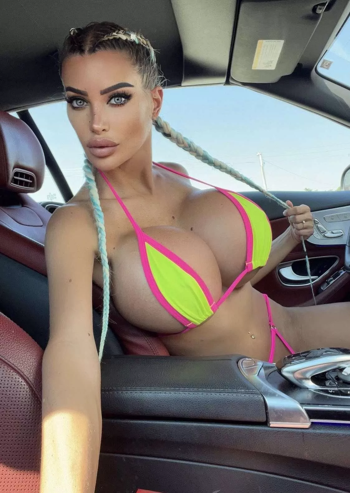 Driving in her bikini posted by NewBimboSimp