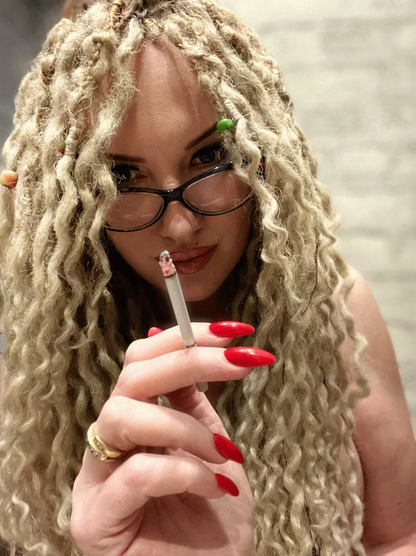 Pretty woman smoking posted by BadAssBitchVIP