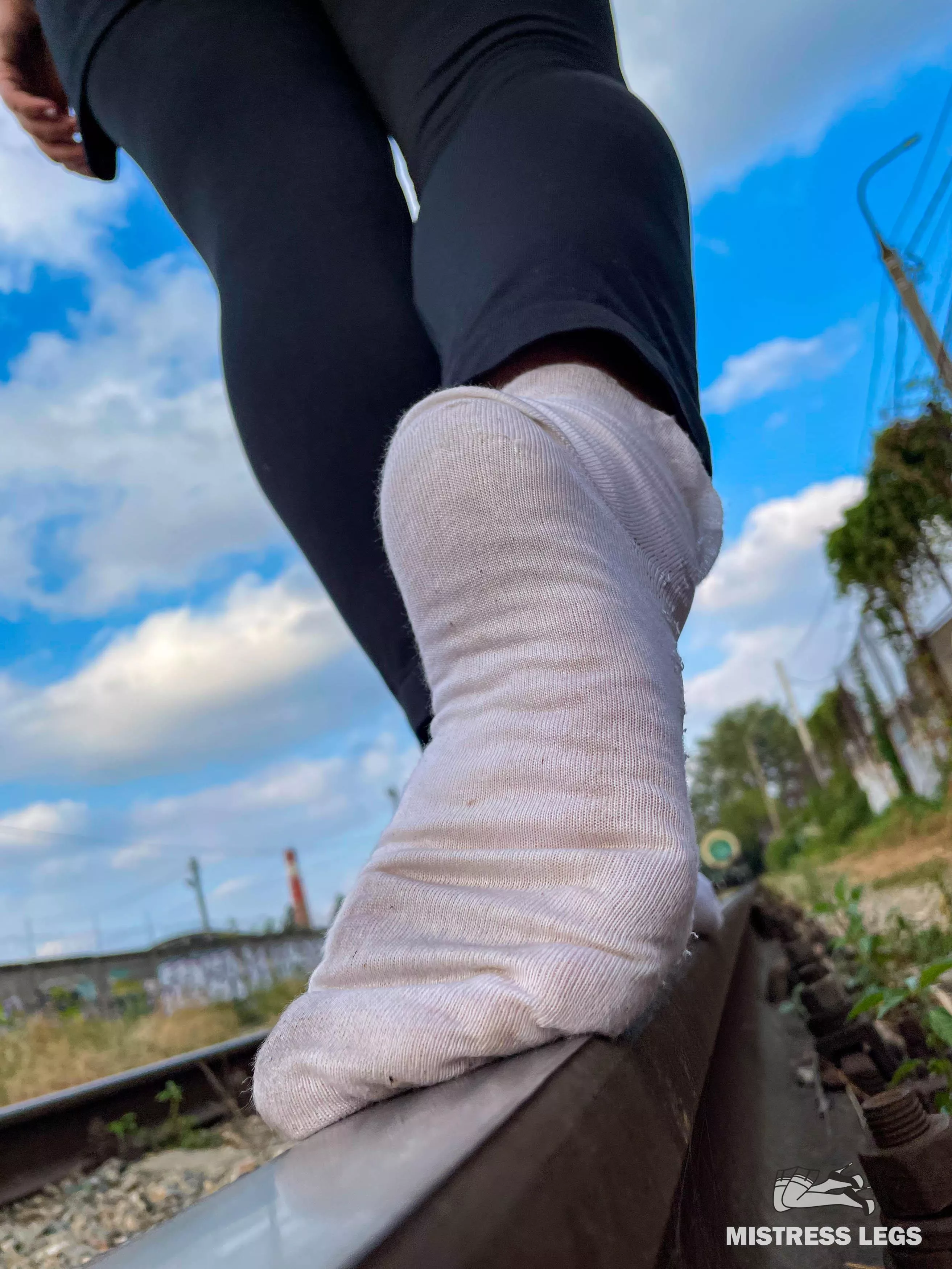 Just walking by the rail in this cute white socks posted by MistressLegs