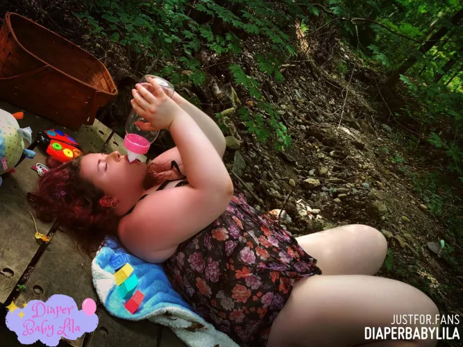 Silly baby! That bottle is empty🤭 by thediaperbabylila