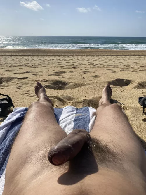 Stiffy on public beach. People were walking by. by gerardHA2NEW