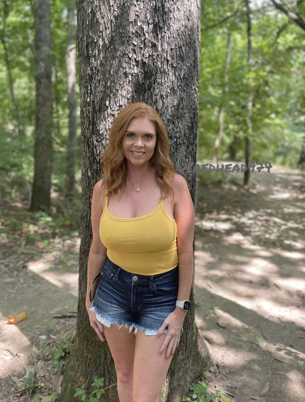 Too hot for a bra posted by Redhead974