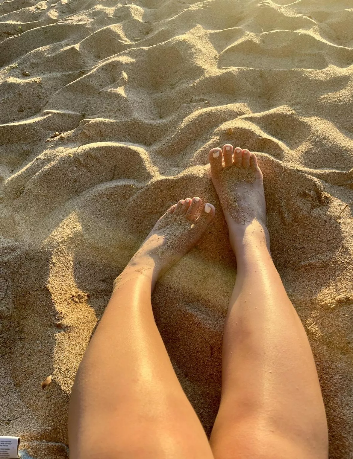 On vacation… who’s going to clean off my sandy soles for me?? 🌞❤️ posted by ellasophiaa