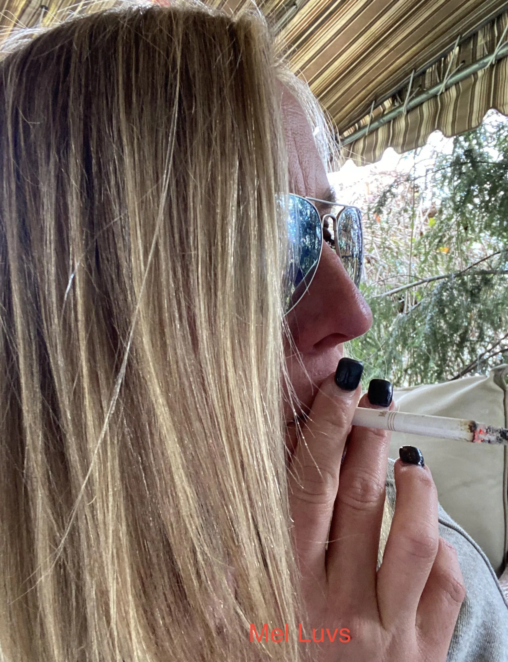 Sneaking a smoke outside.... posted by melluvsitall