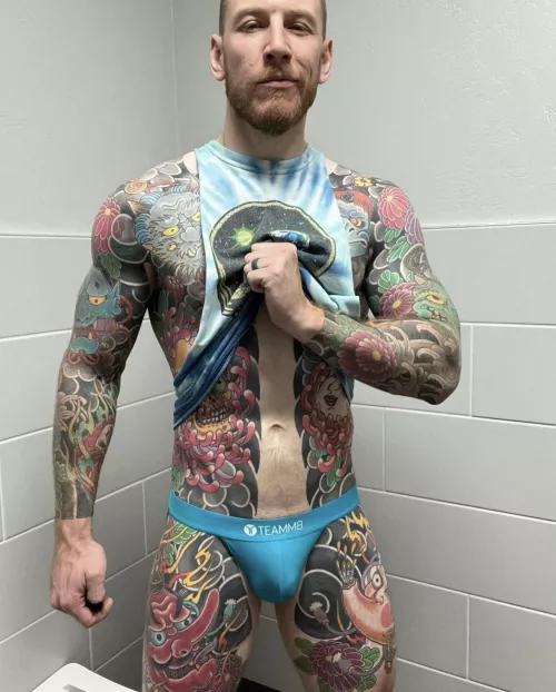 Getting ready for a workout by onebigtattoo