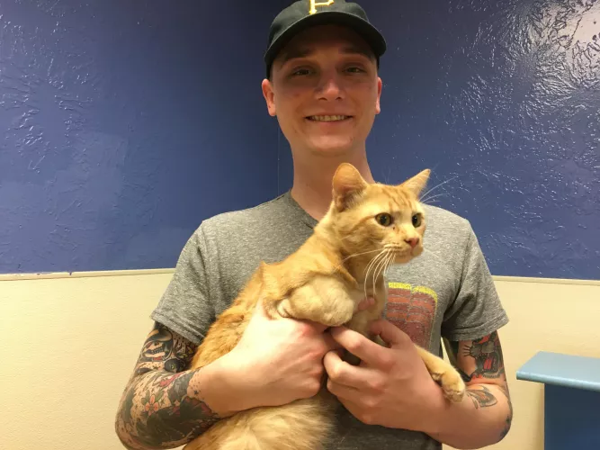 A three legged cat named Rusty and I. by Doomblade6