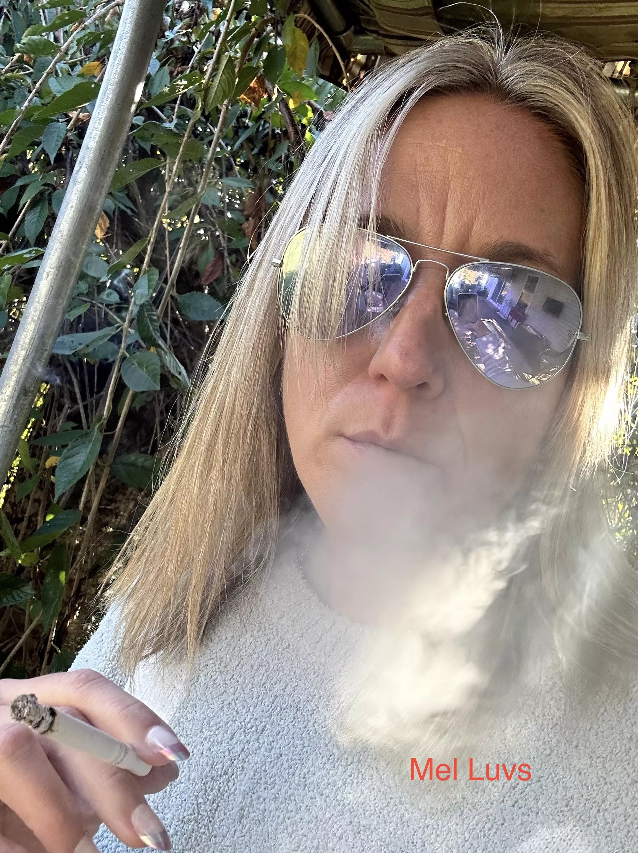 Hot MILF Smoking vibes..... posted by melluvsitall