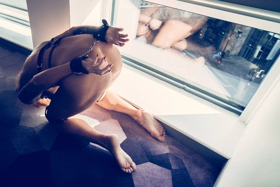 Cuffed by the hotel window for all to see posted by ScottishSophie