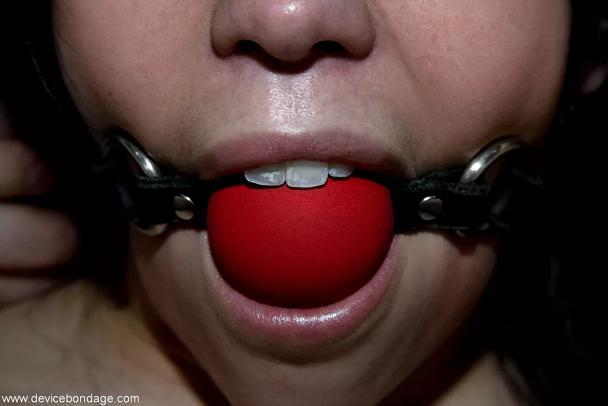 Ball gags go *BEHIND* the teeth, always posted by DiggBoobs2