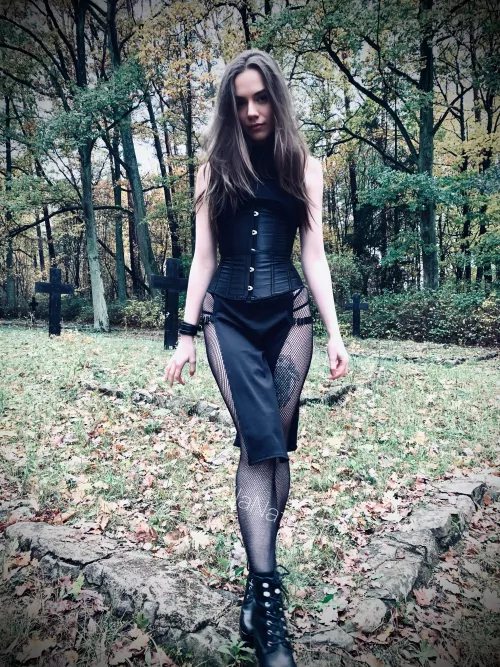 It’s a super tight corset and dress cut on sides all in Halloween style by BellaNatural