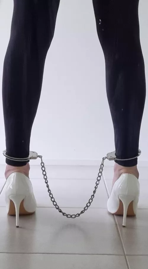 Cuffed in heels by CelebsinHeels01