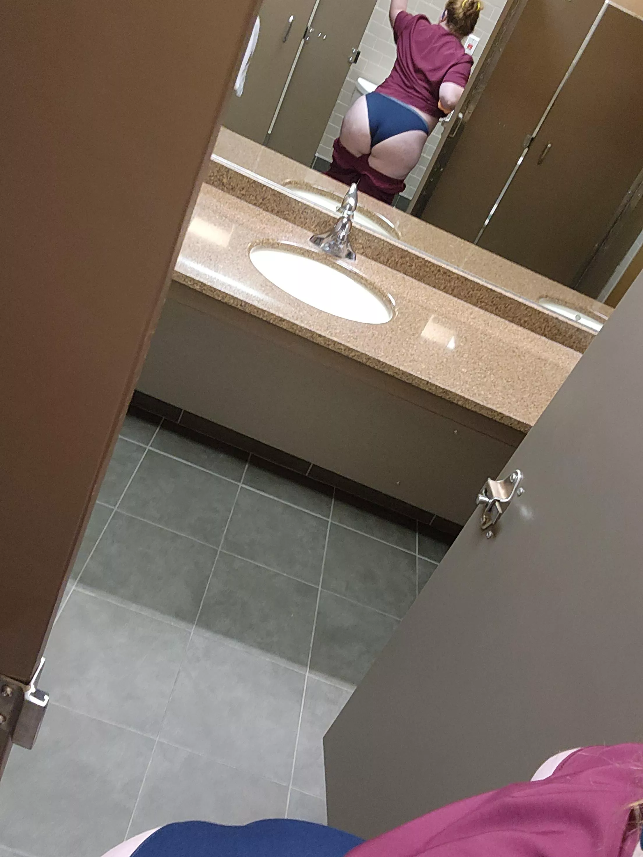 Naughty nurse in public bathroom apparently with a wedgie. posted by trippytippy89