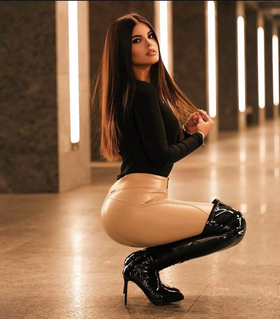 Shiny black boots posted by BuyerNo7542