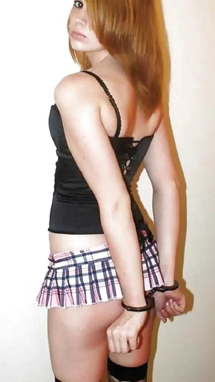 young redhead teen, metal cuffs keeping their hands out of the way posted by narr67