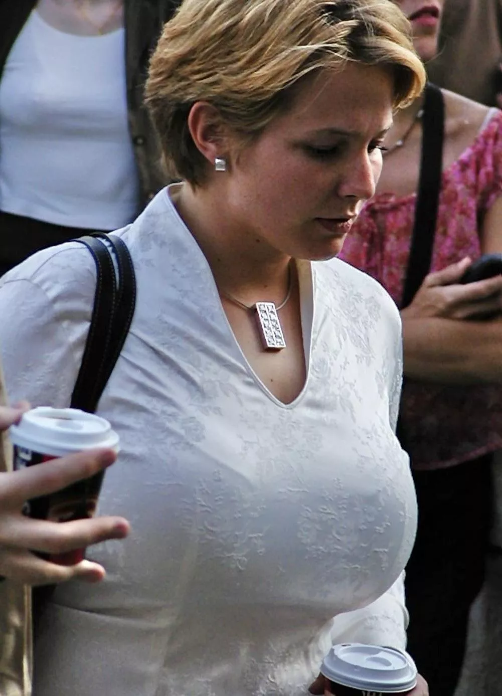 Busty Blond with Big Tits in a tight Satin Top posted by johnny1993c