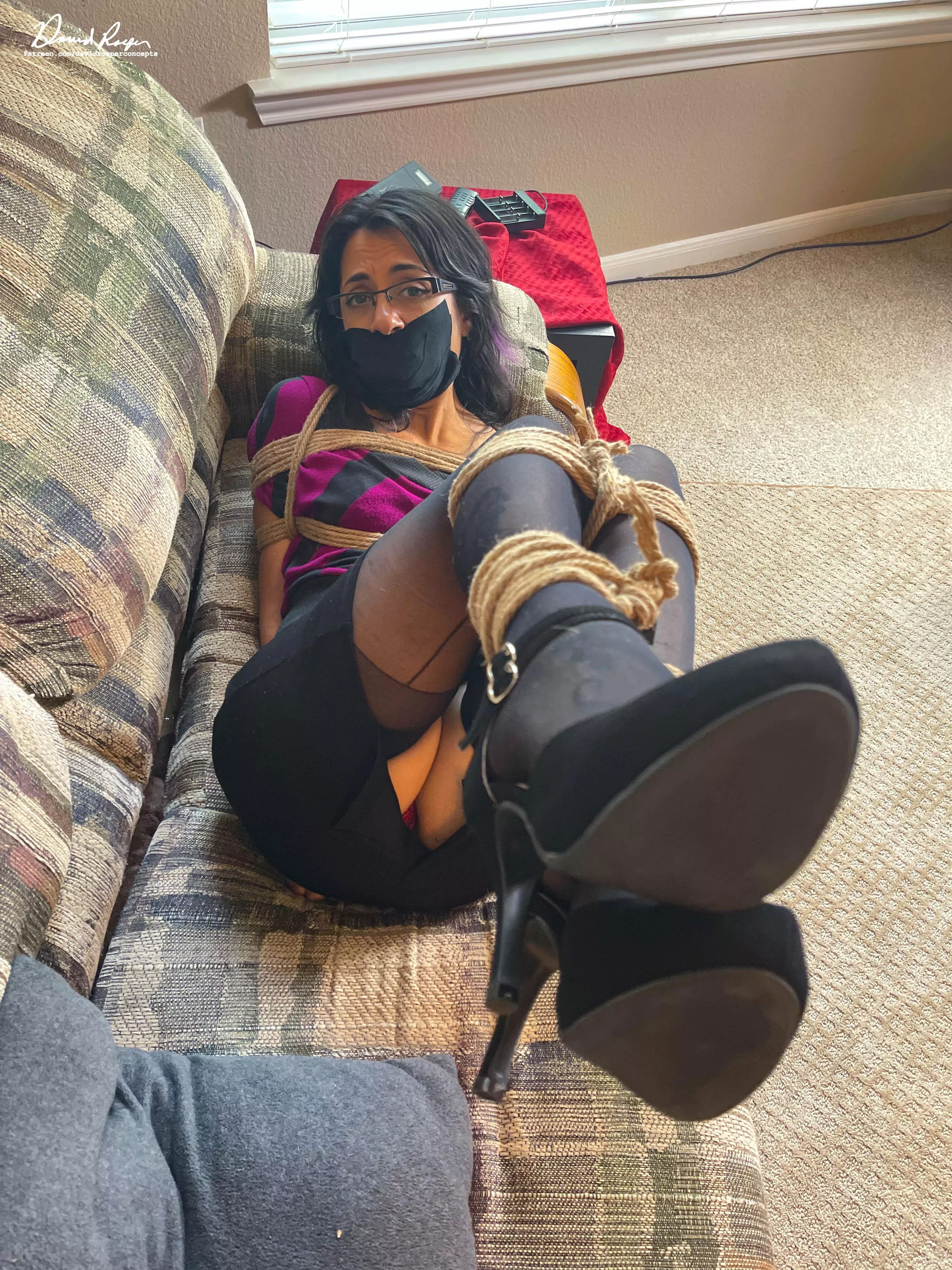 Bri is either showing off her nice heels or asking to be untied. posted by DavidRoeperConcepts