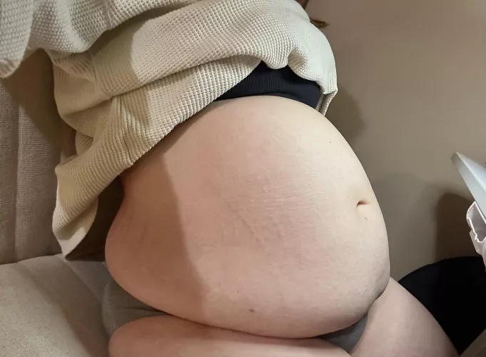My belly is so swollen and stretched tight by fatbelli