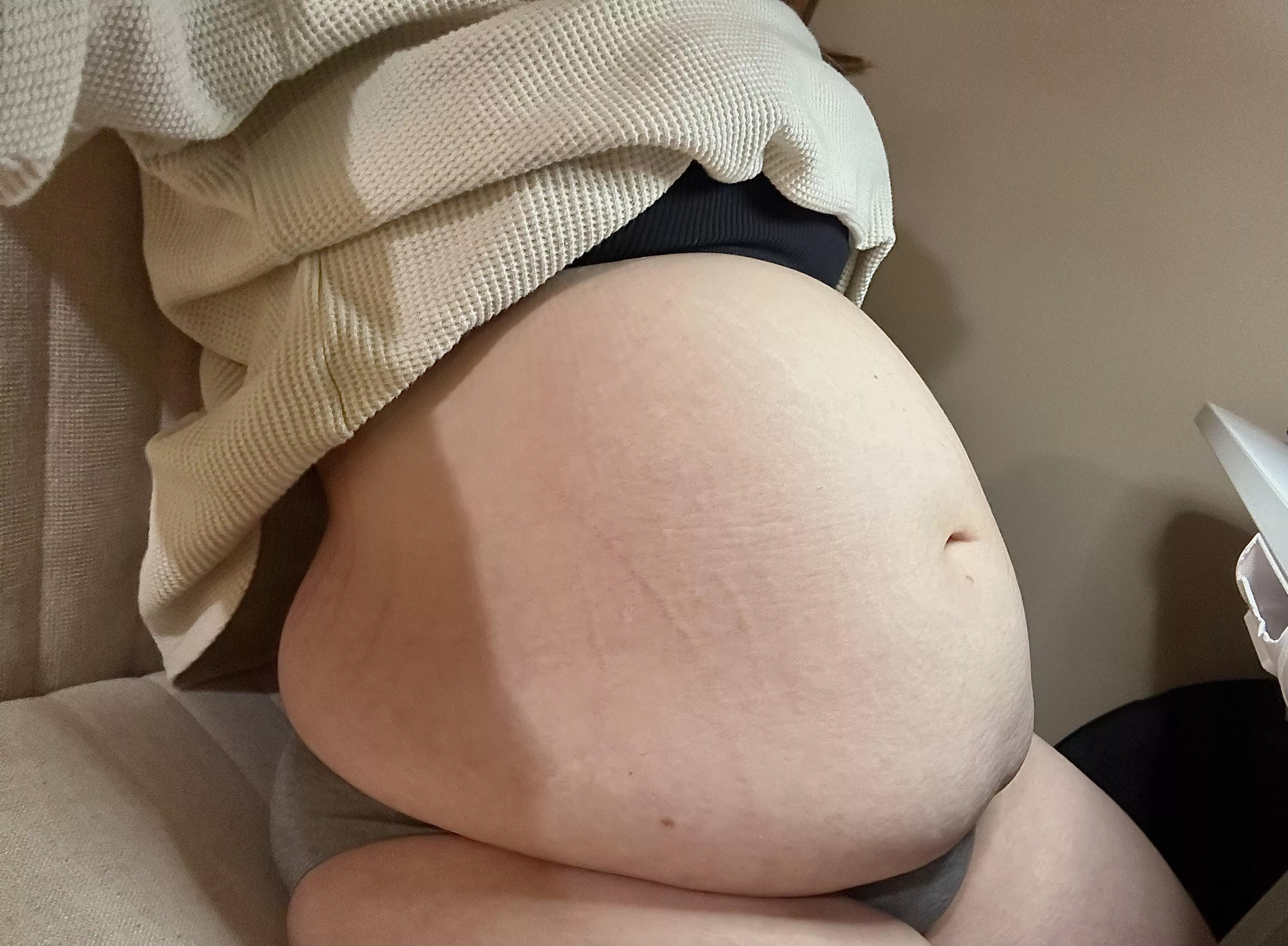 My belly is so swollen and stretched tight posted by fatbelli