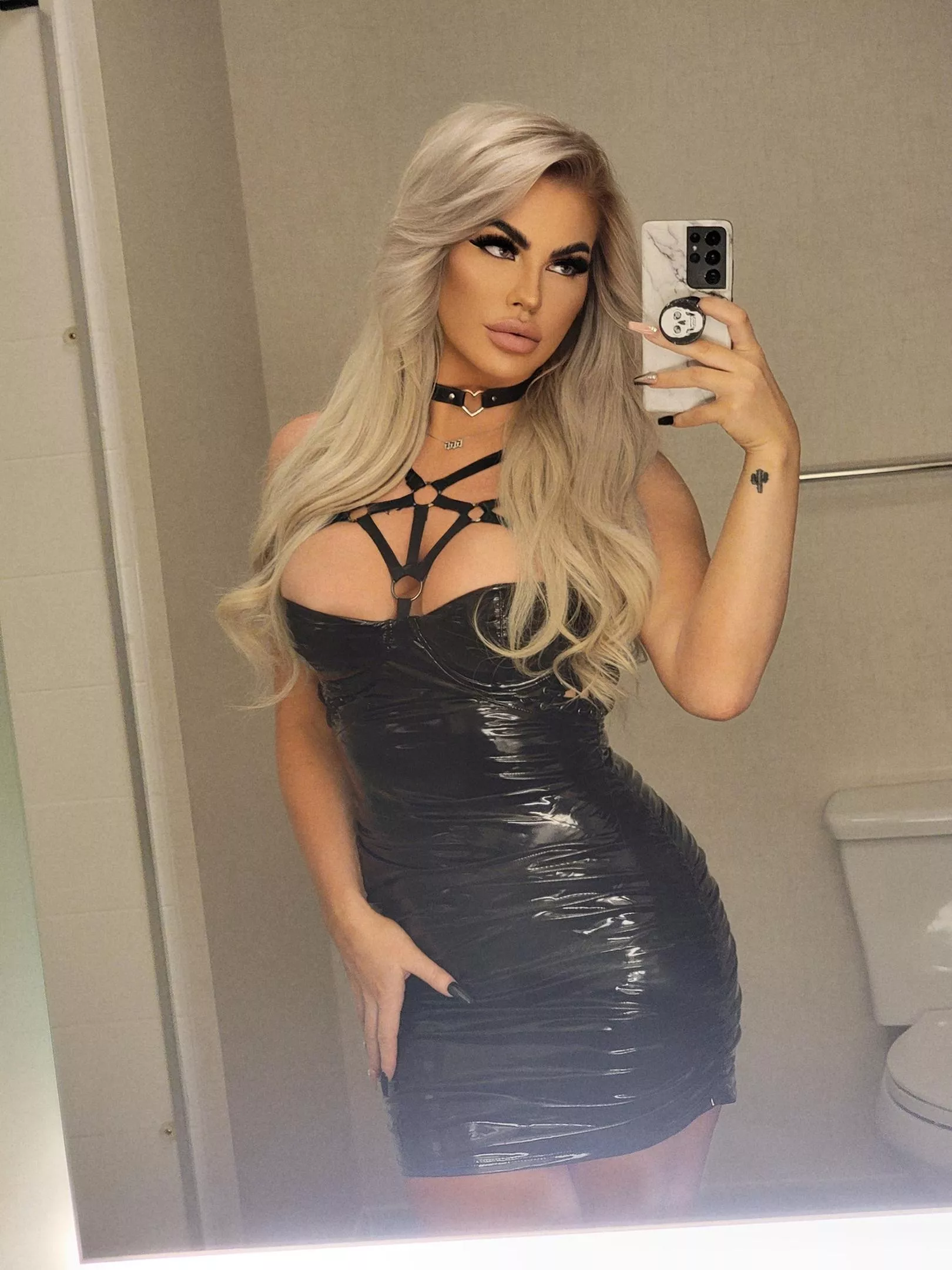 Do you like how my booby pops in this black dress? posted by SouthProtection7924