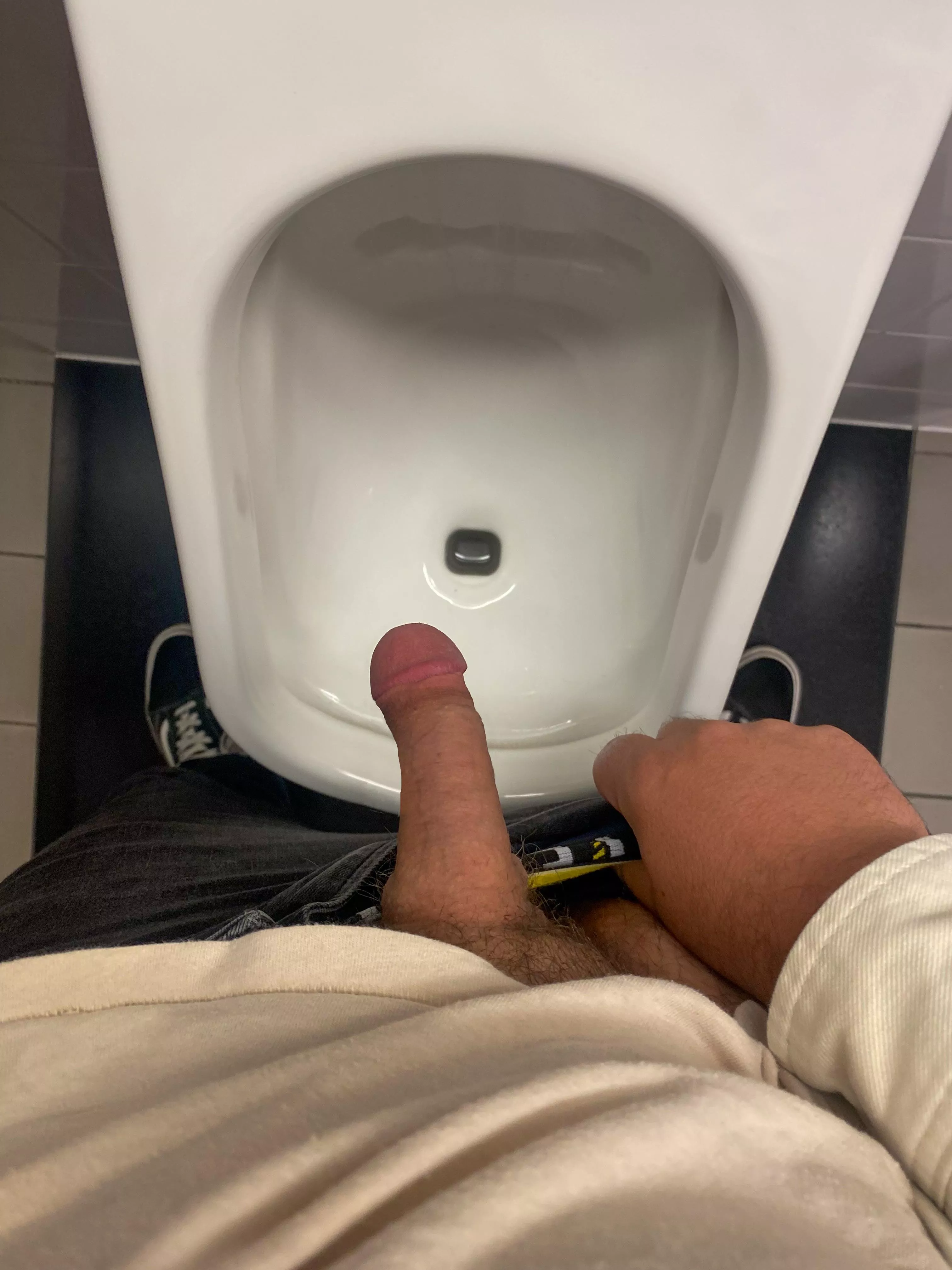 At work urinals with my soft cock out. Hoping the boss will catch a a glimpse. posted by Such_Investment_9933