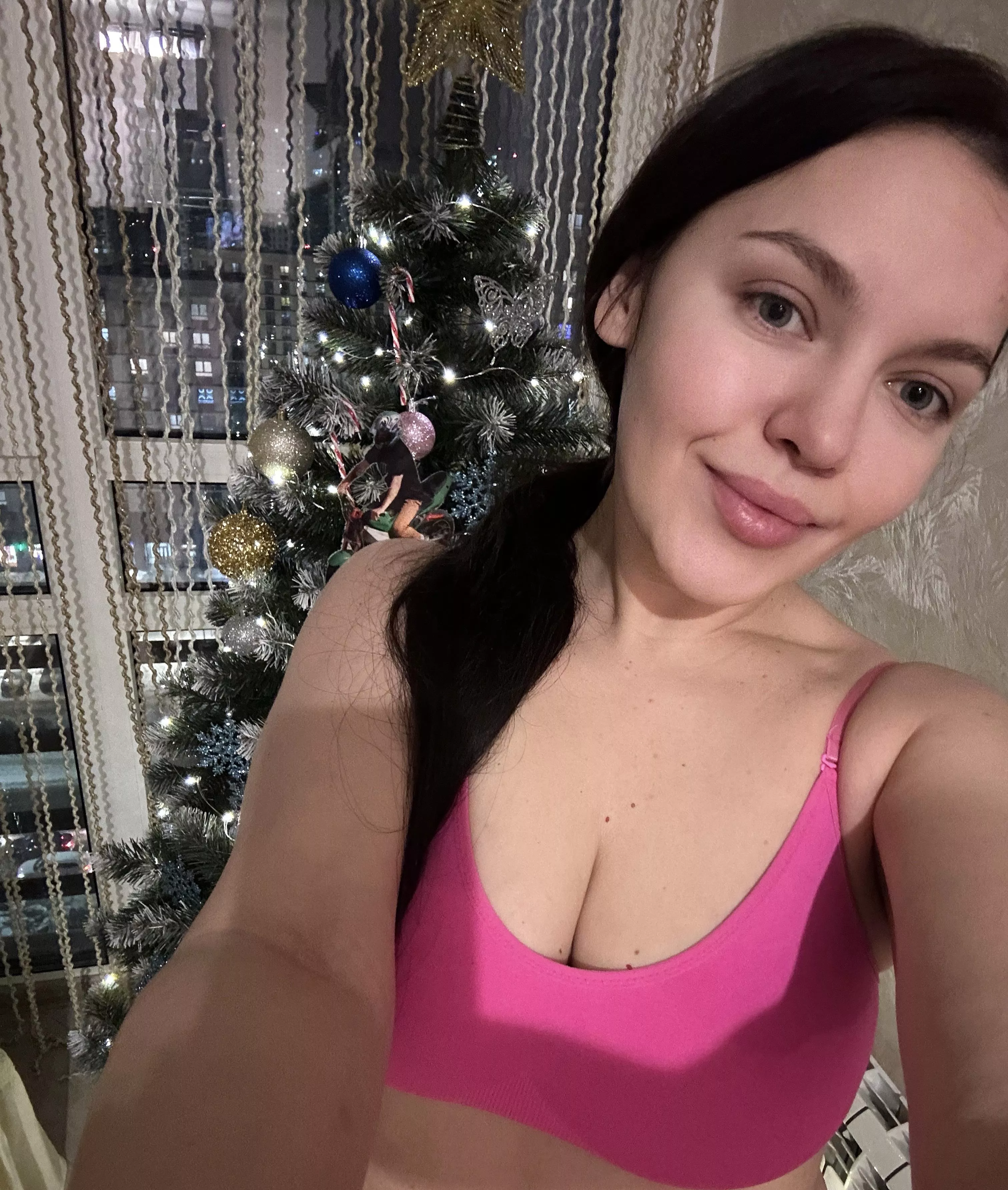 Christmas selfie in a pink top posted by Quiet-Tradition-3856