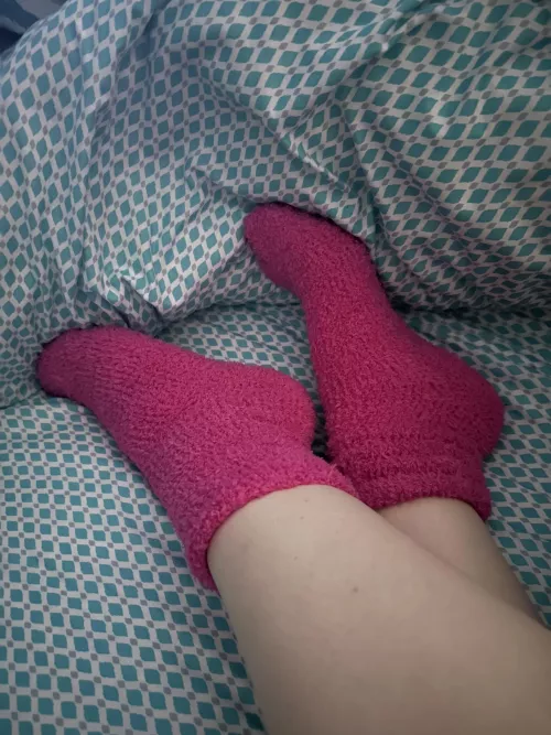 In bed in new fuzzy socks. Do you wonder my toe color? by MilkyAffection