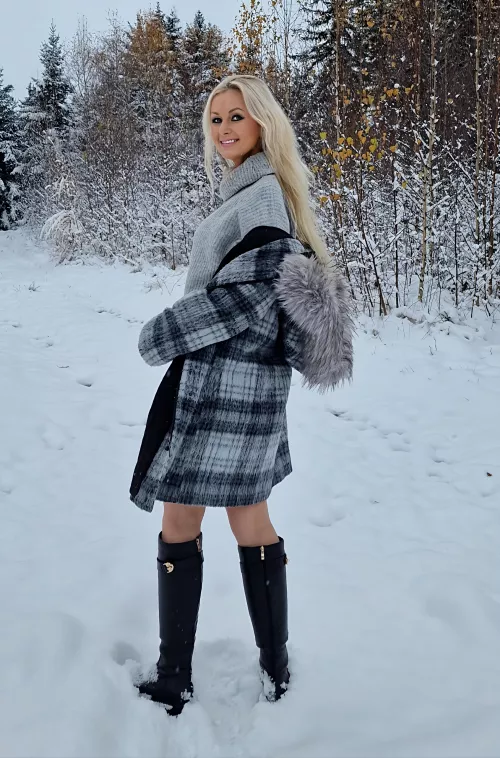 Knee high boots in the snow, covered but still sexy by OrganicAbilitys