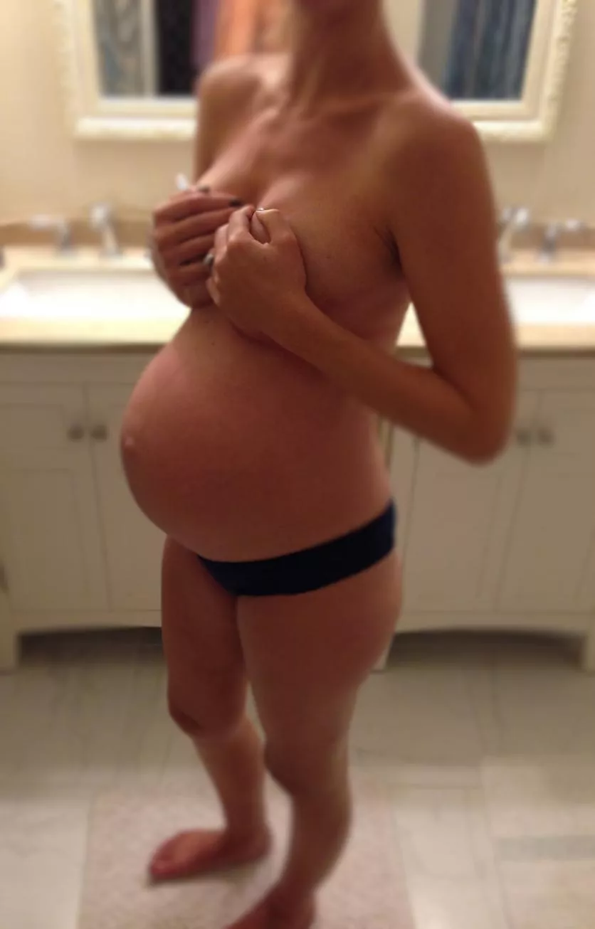 holding her swollen boobies :) posted by a_mellow_mood_