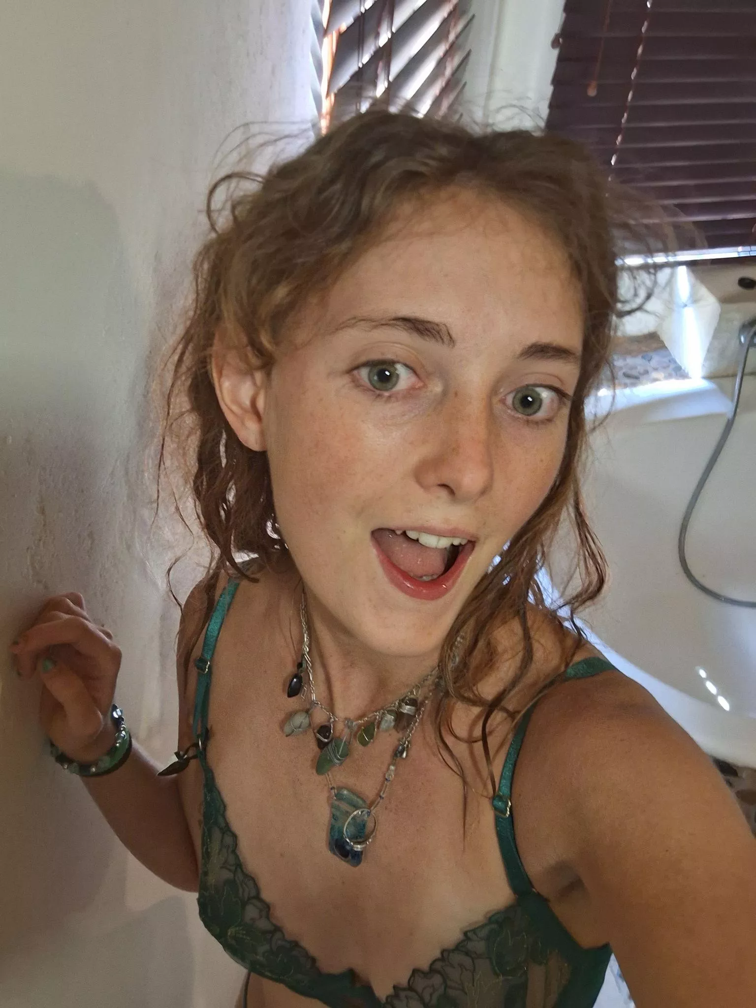 green lingerie, funny face, lets get playful babe posted by Atarlock