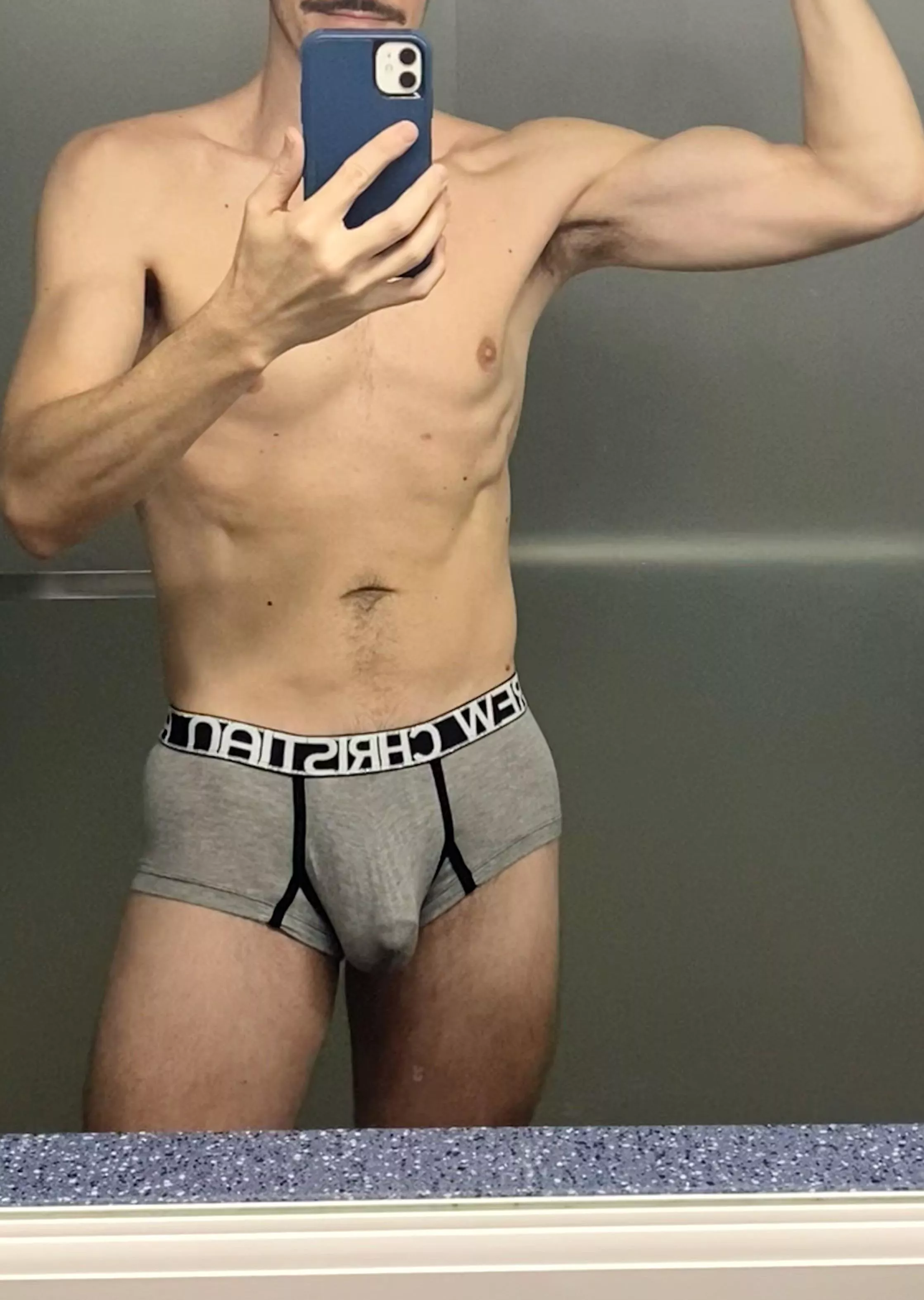 A little flex while getting dressed posted by rhh1977