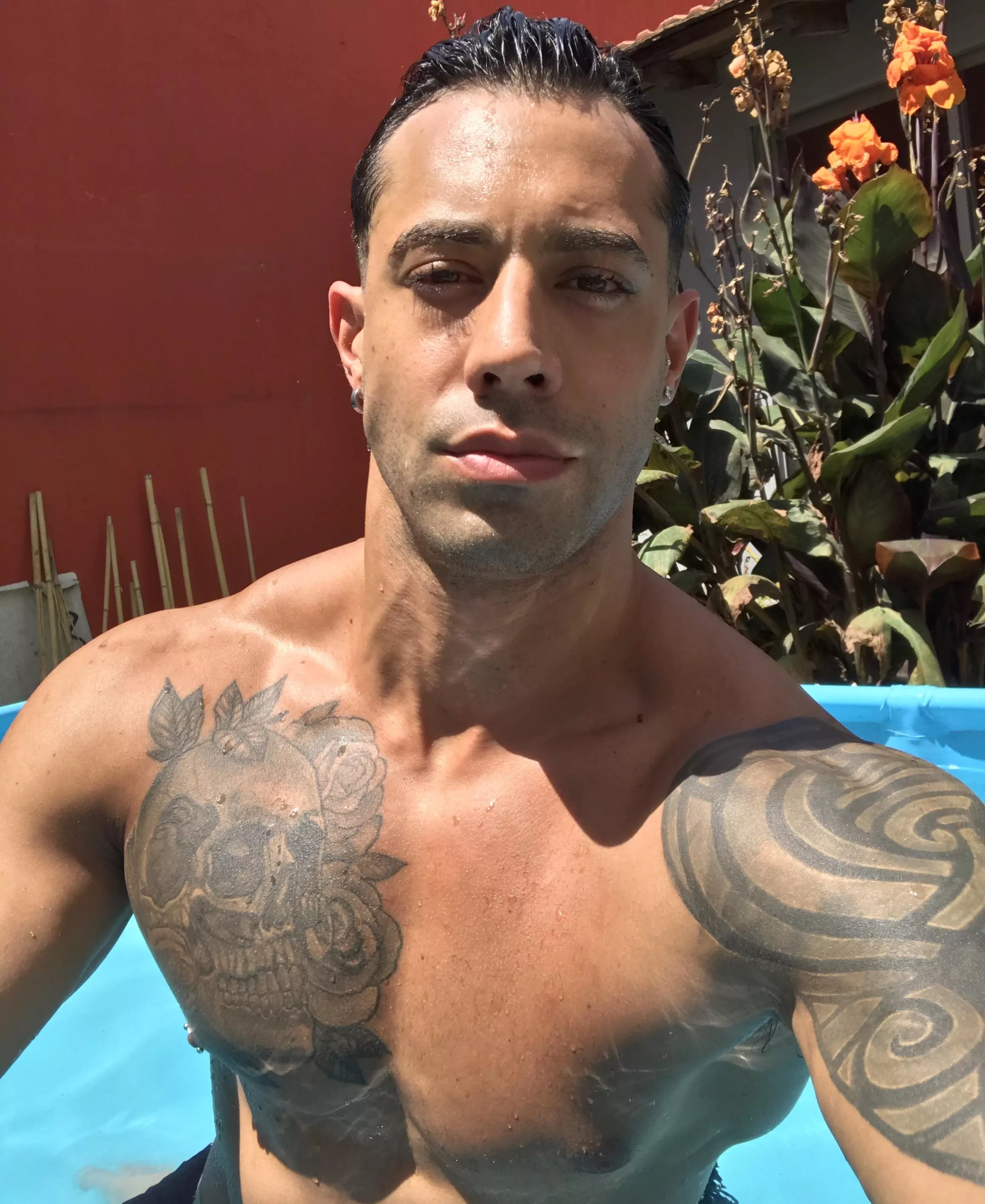 Taking sun posted by TattooedMuscled