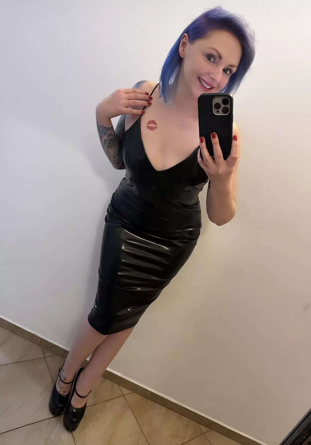 Shiny and tight posted by theinkedsiren1