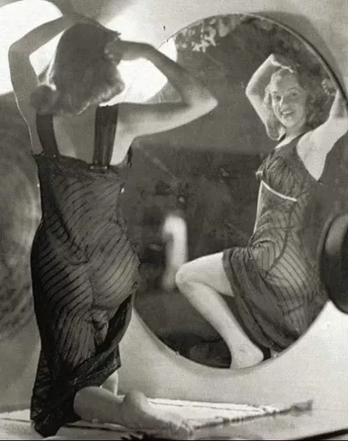 Norma Jeane Mortenson in front of a mirror, 1947. Photo by Earl Moran by Quick_Presentation11