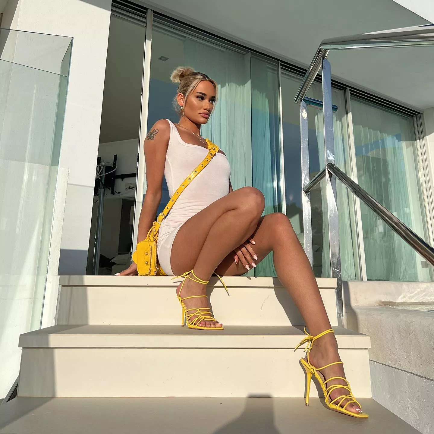 Who says white plain dress is boring? posted by WorldlinessOk7796