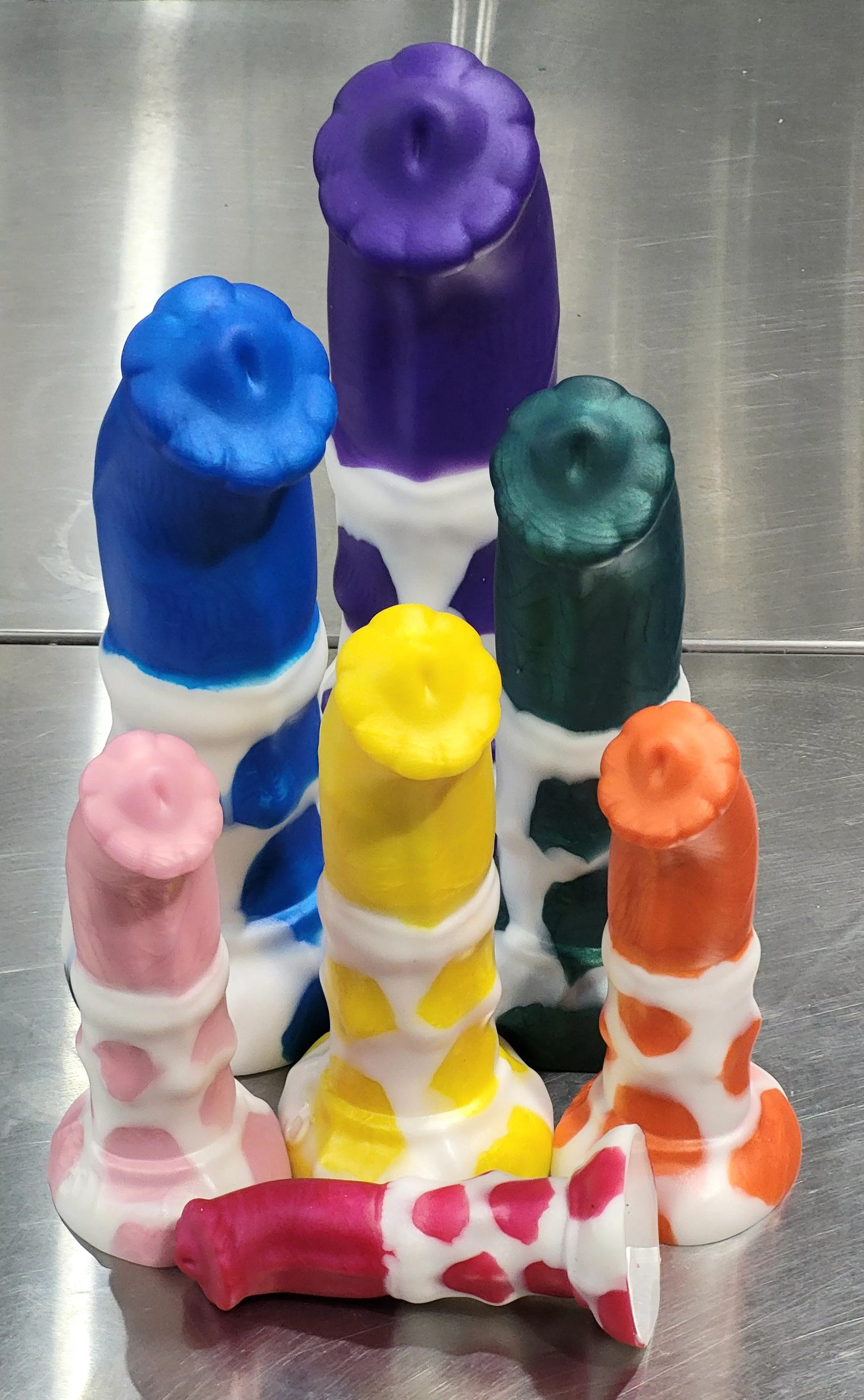 A whole herd of rainbow cows! posted by wanderingbardtoys