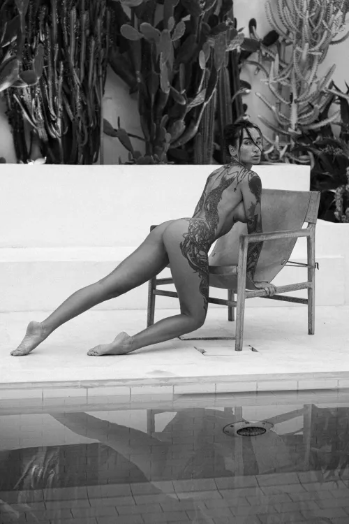 Poolside relaxation by Match_Medium257