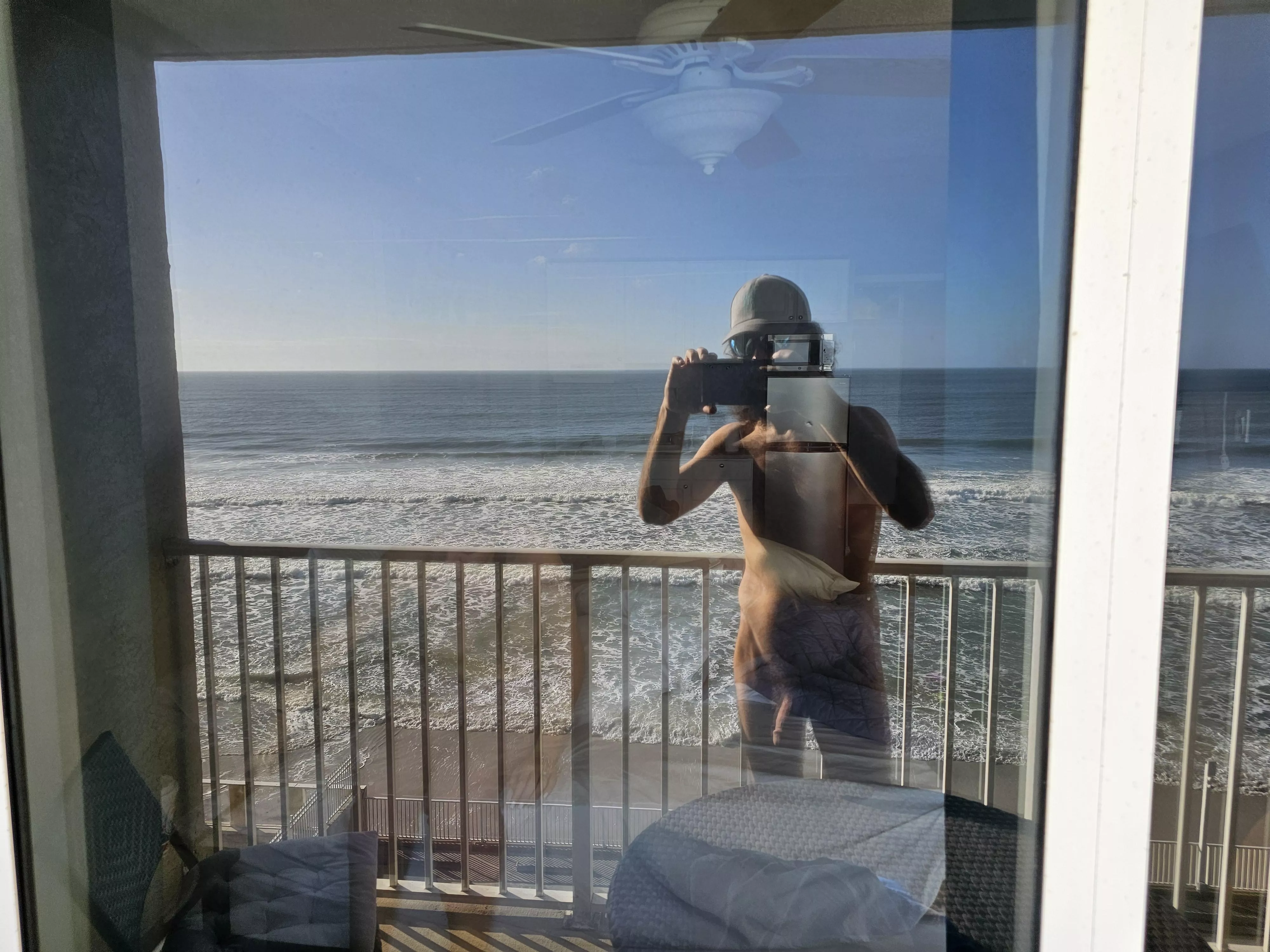 Getting some early morning sun on the hotel balcony posted by Lessclothing