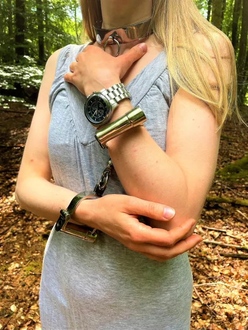 Steel cuffs makes forest walks more intense... by JessicaShackled