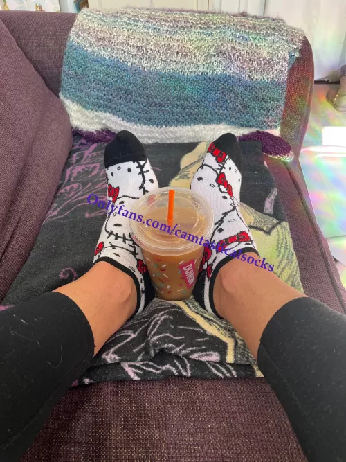 Hello Kitty is enjoying some iced coffee for a change! by camtasticalsocks