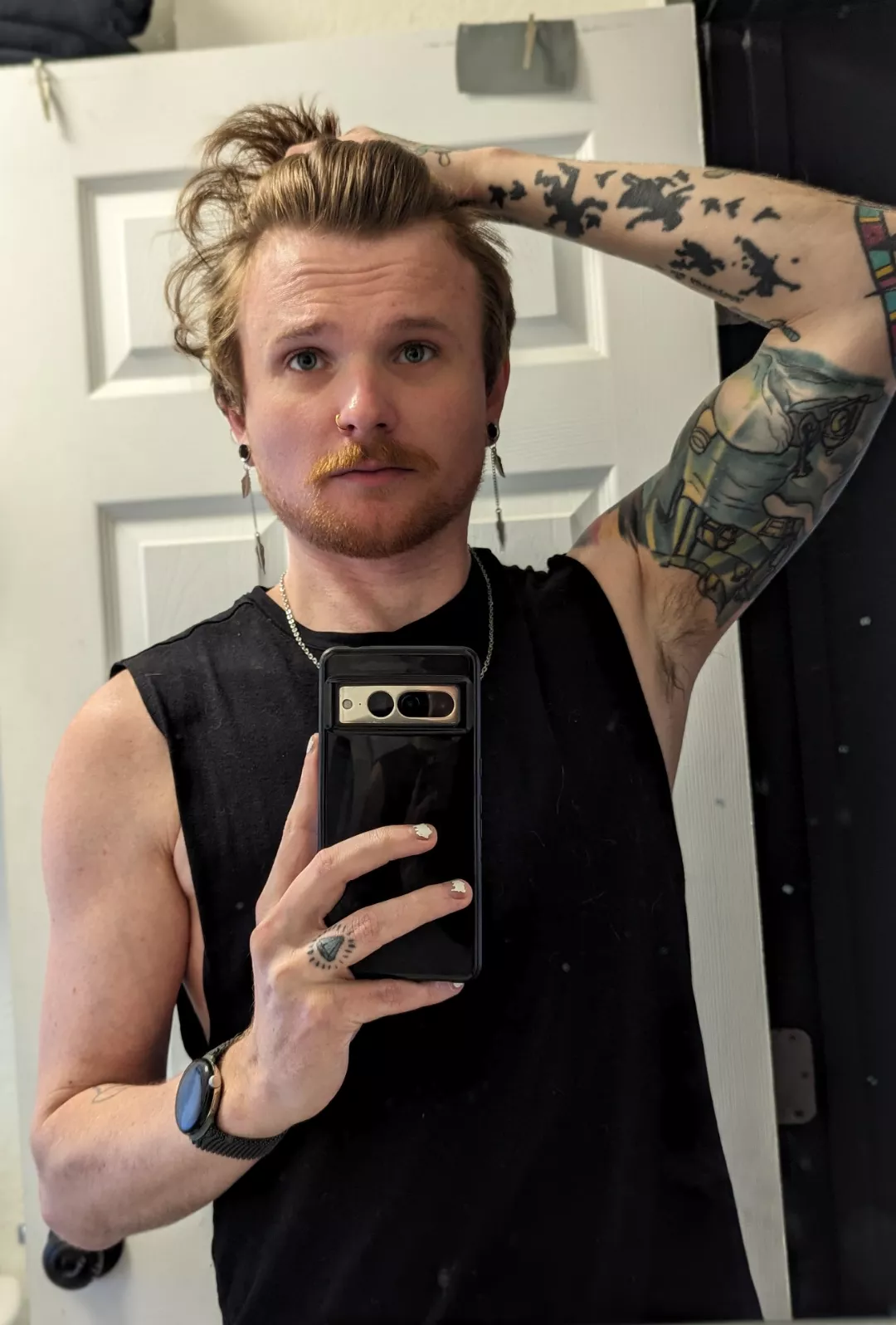 Growing my hair out, it's in that awkward phase - so fighting the urge to buzz it.  posted by throwitaway_insideme