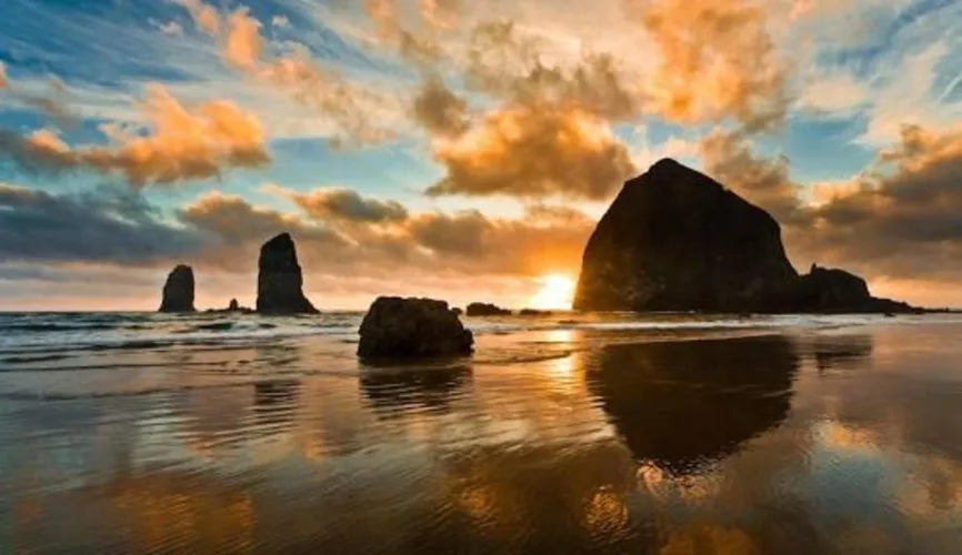 Cannon Beach with sunset in Oregon by Time-Nature7373