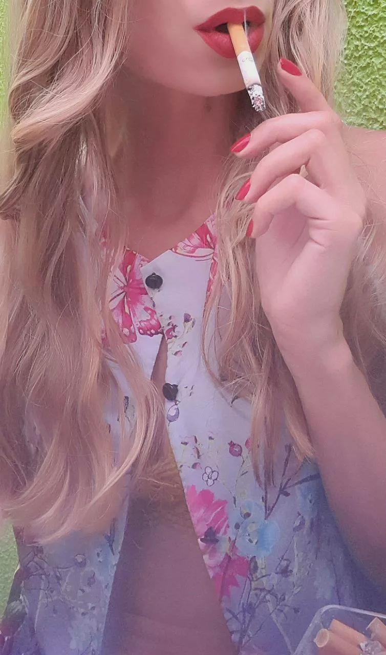 I love to let it dangle between my red lips 👄 posted by layla-blue-