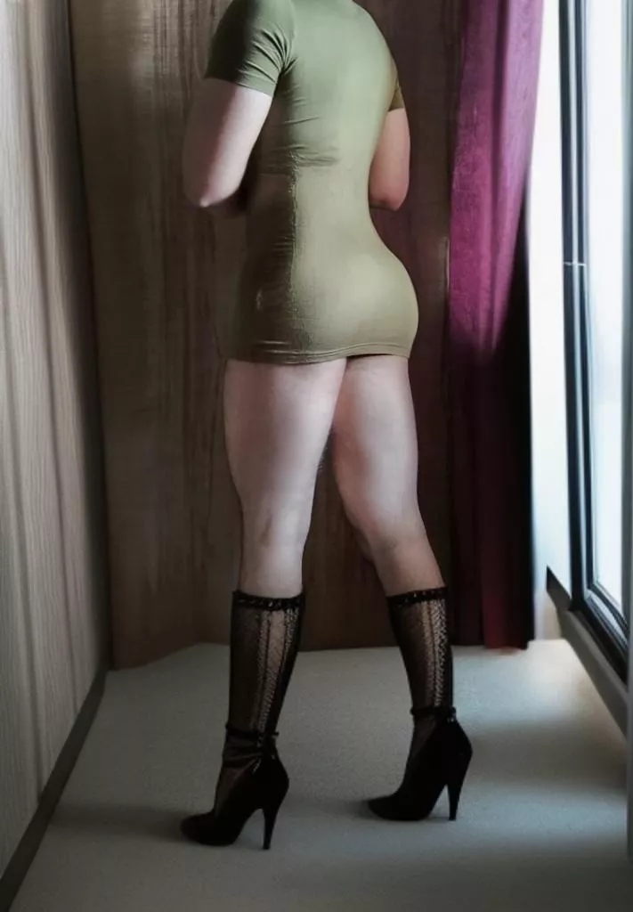 Wearing high heels on mini dress  posted by Glamguy20