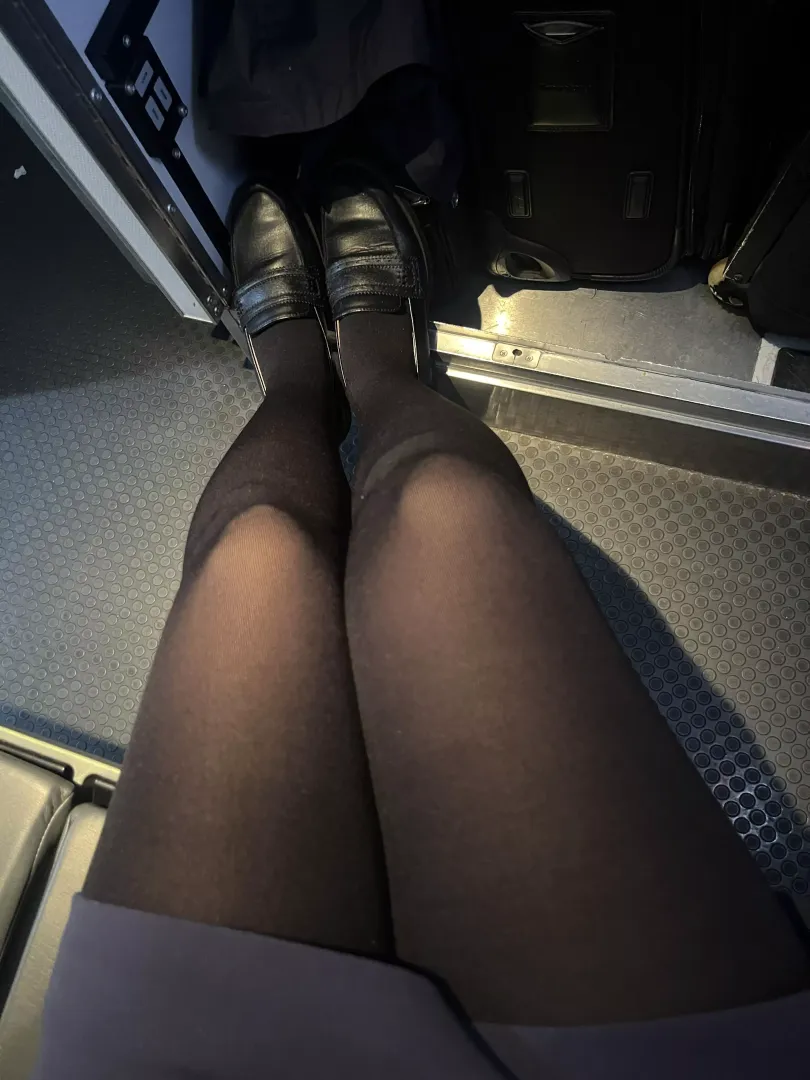 early morning flights mean putting my feet up posted by WornByStewardess